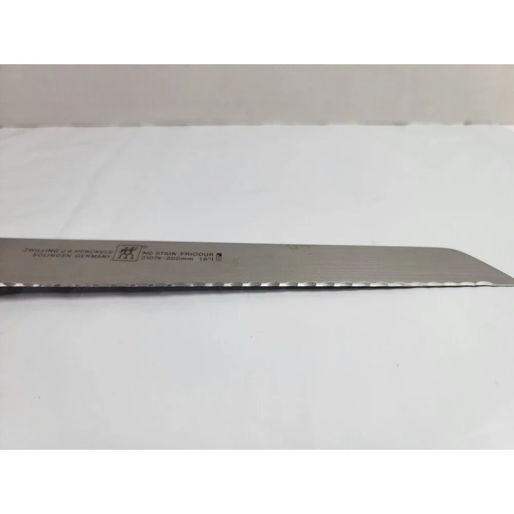 Zwilling J.A. Henckels Four Star 8” Serrated Bread Knife 31076-200 Germany